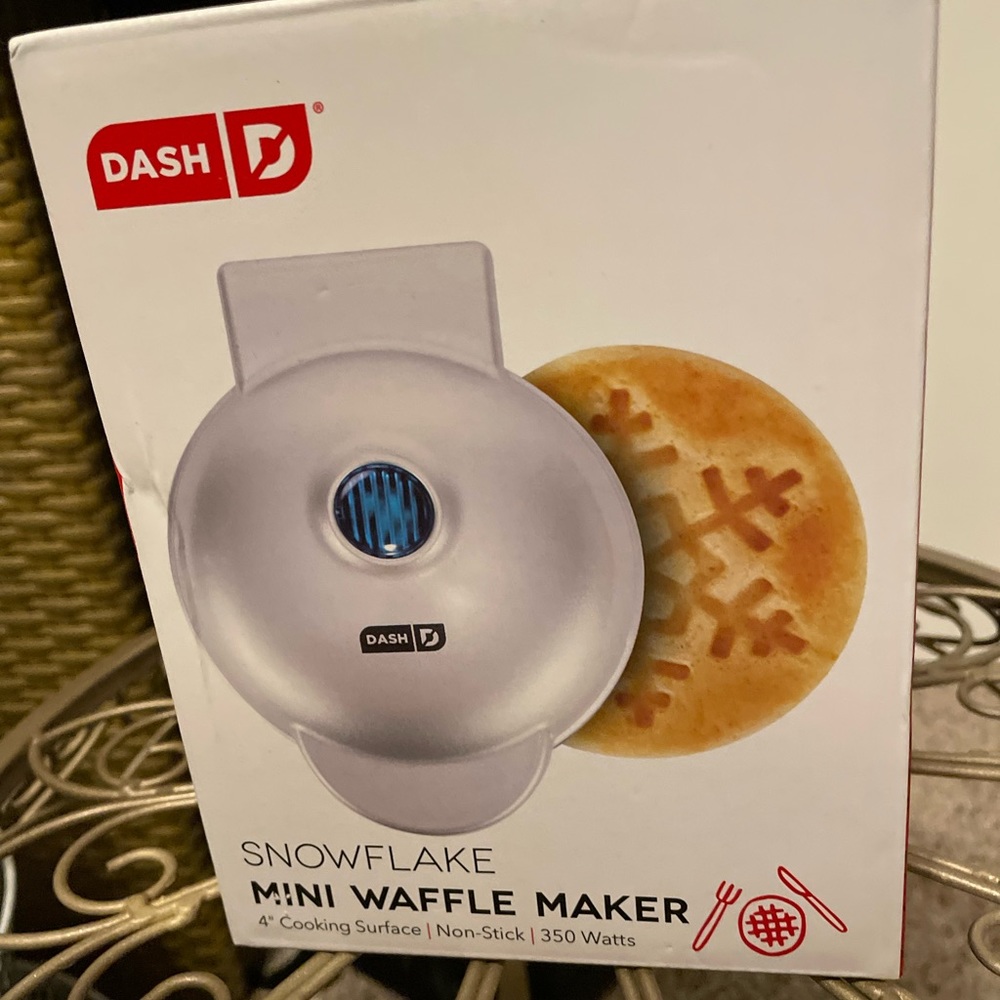Mini waffle maker, never been used.